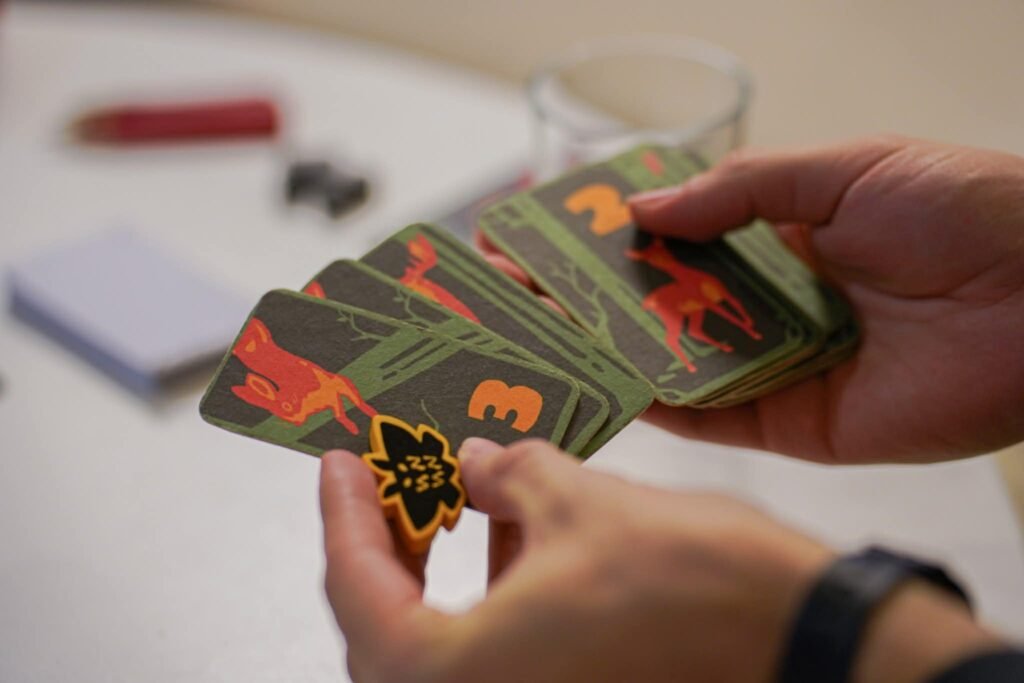 Card of boardgame Laužas